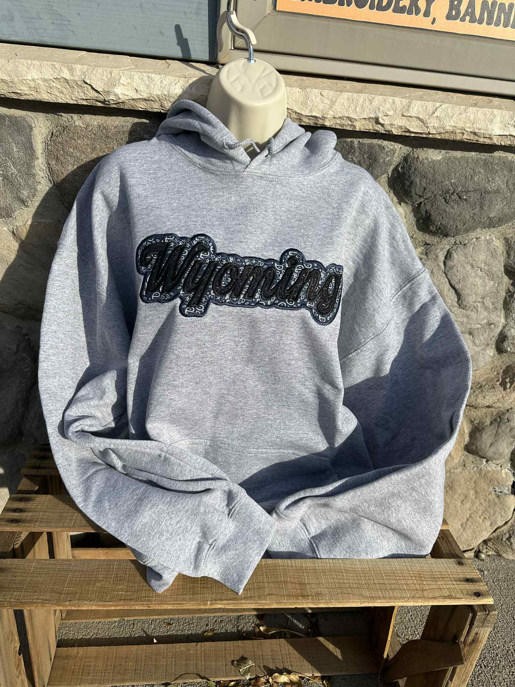 Wyoming black sparkles with blue western applique Embroidery Hoodie