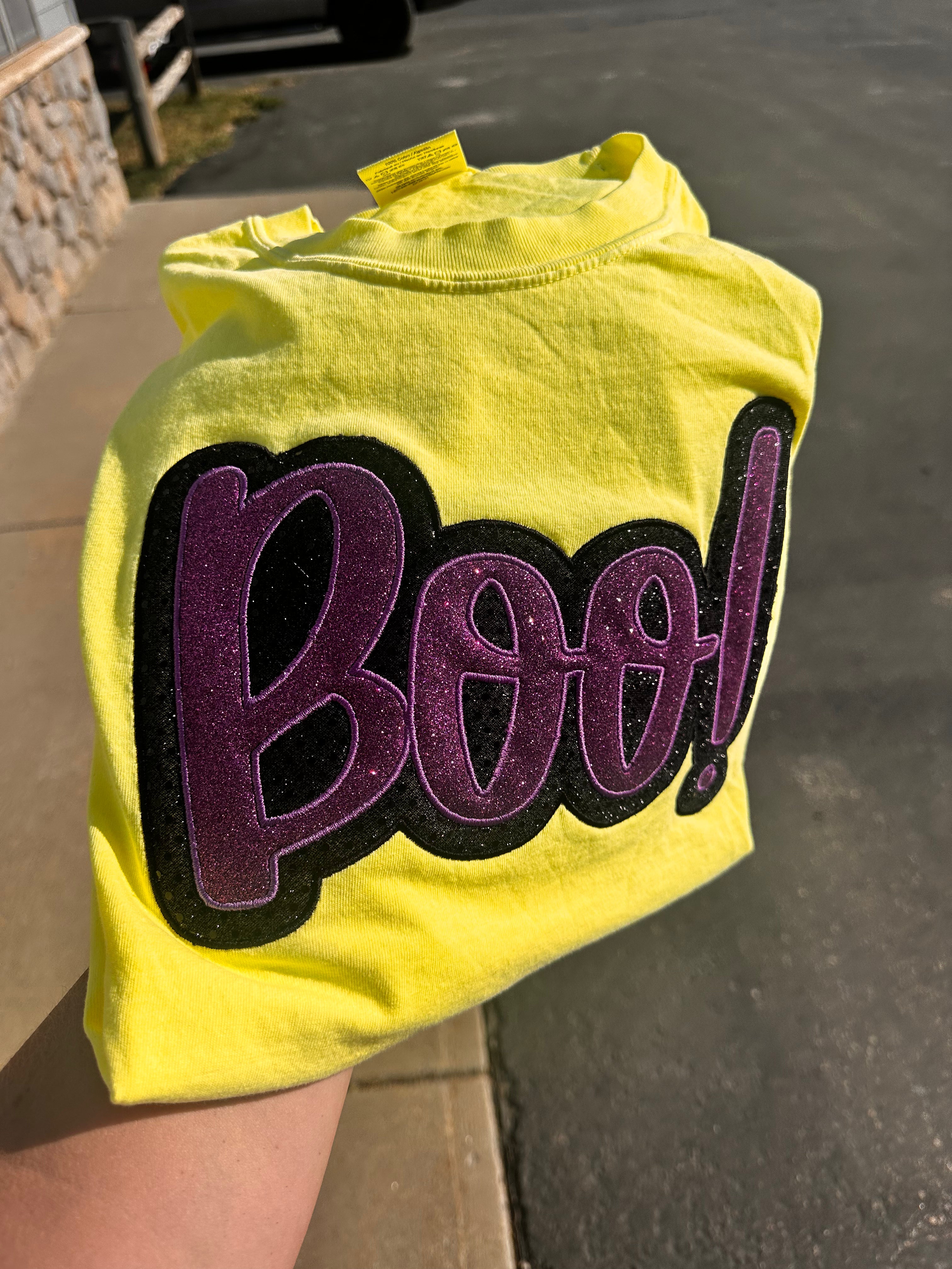 Black and Purple sparkly applied BOO embroidered on neon yellow Comfort Colors T-shirt