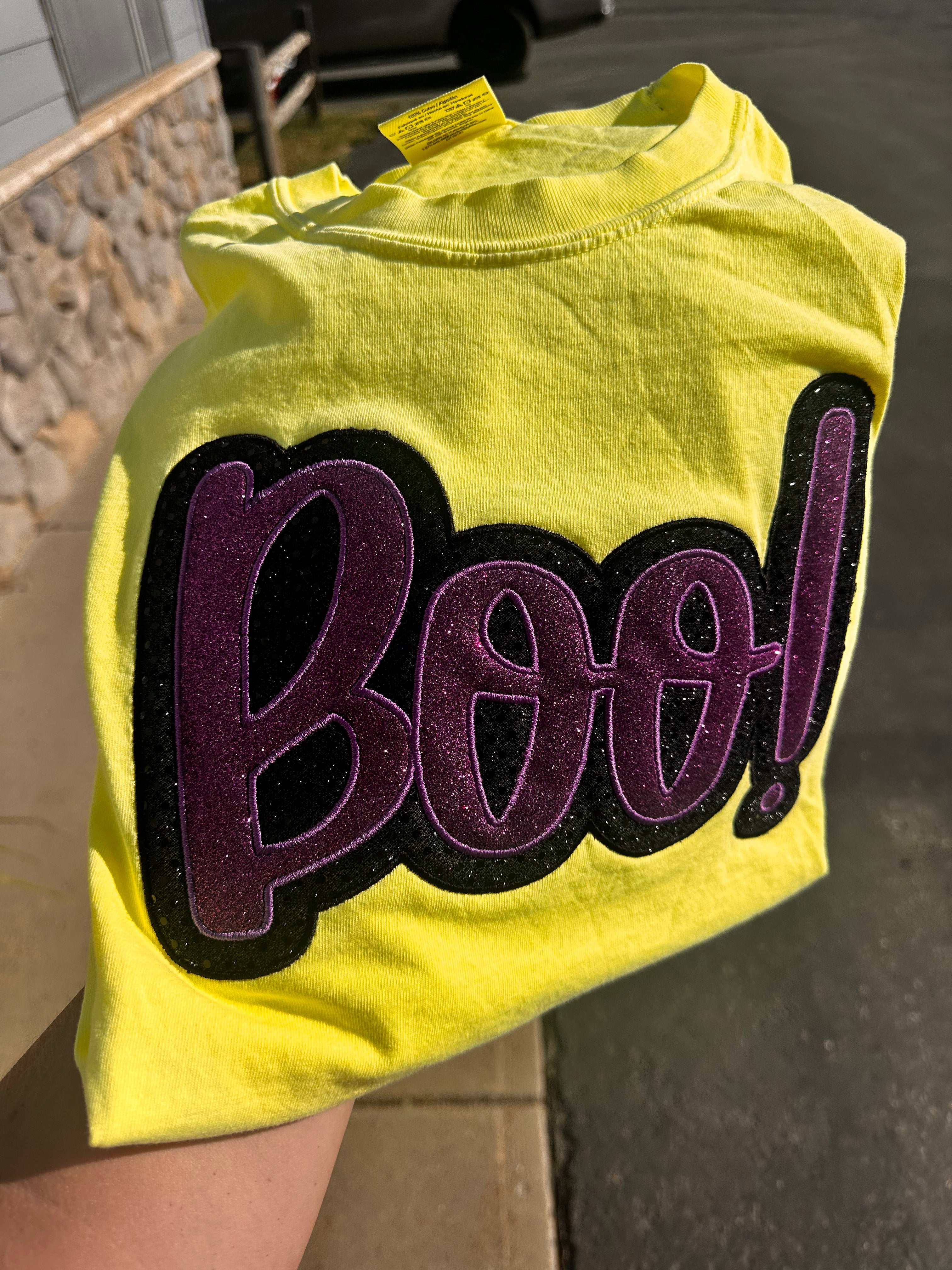 Black and Purple sparkly applied BOO embroidered on neon yellow Comfort Colors T-shirt