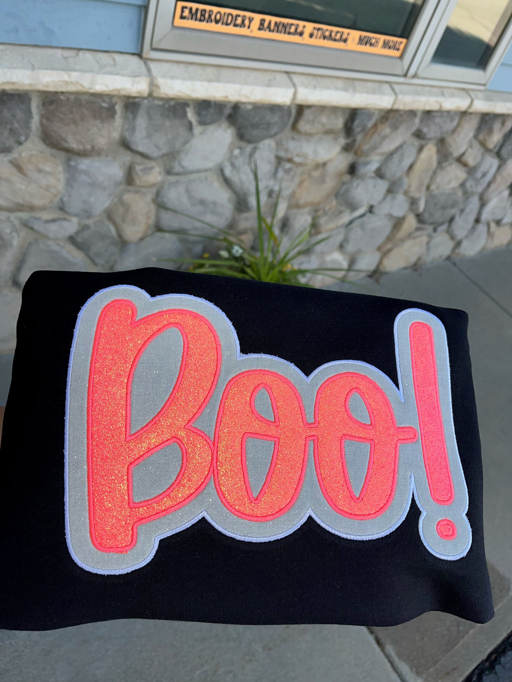 Pink and white sparkly applied BOO embroidered on Black Crewneck