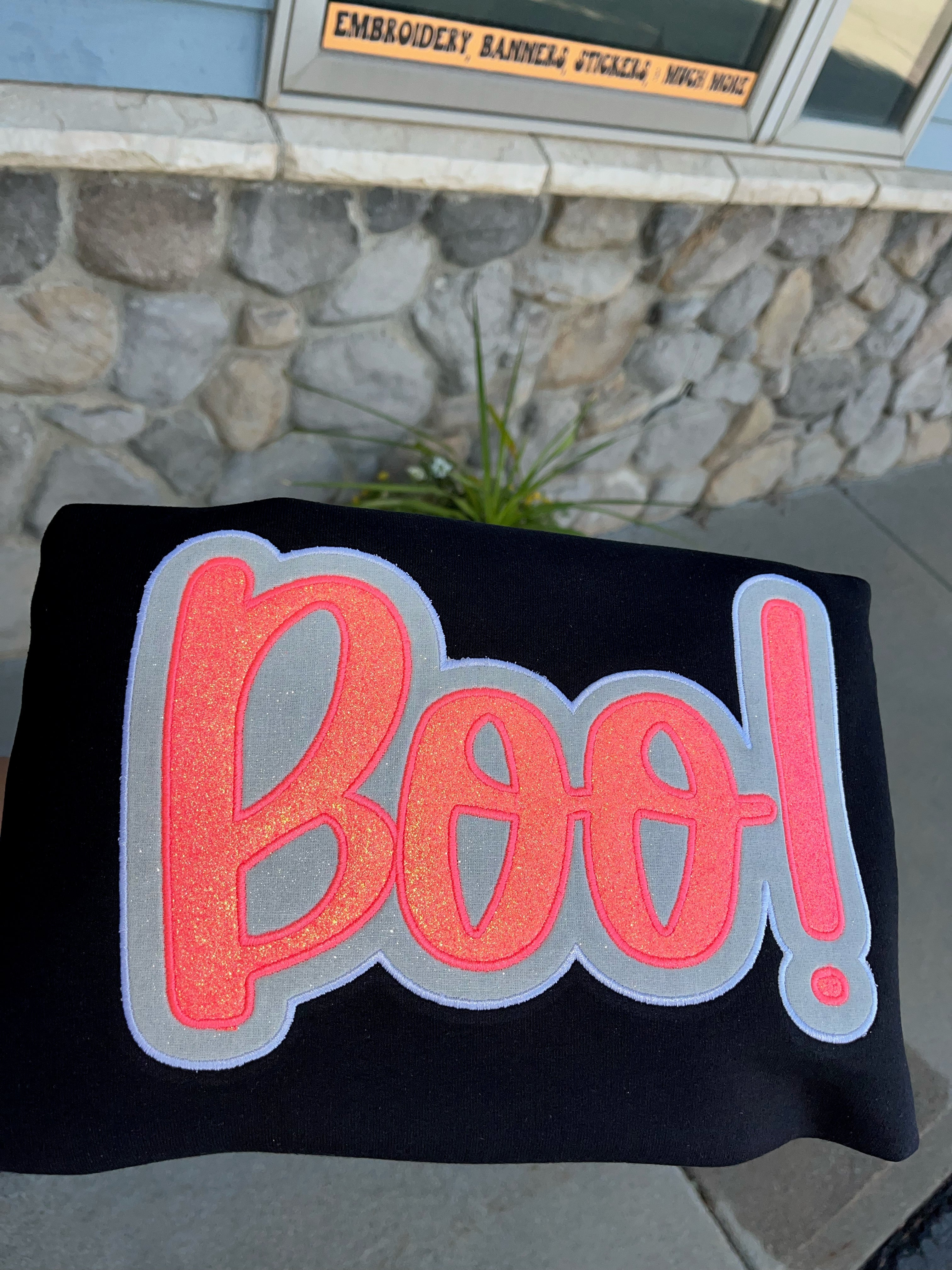 Pink and white sparkly applied BOO embroidered on Black Crewneck