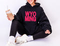 Wyoming Stacked red and pink checkered hoodie